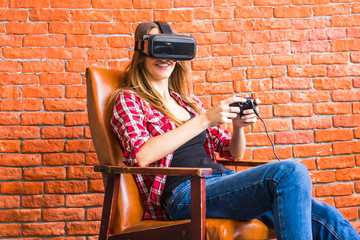 Woman play the video game with virtual reality device