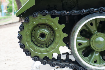 Tracks of the tank on a pedestal close up