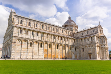 Fototapeta na wymiar Cathedral and the Leaning Tower of Pisa at sunny day, Italy.