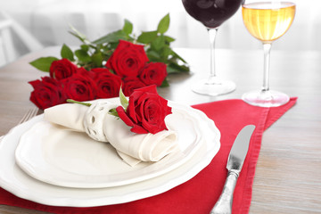 Beautiful table setting with flowers