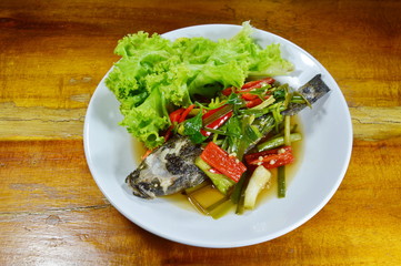 steamed sand goby fish with soy sauce on dish