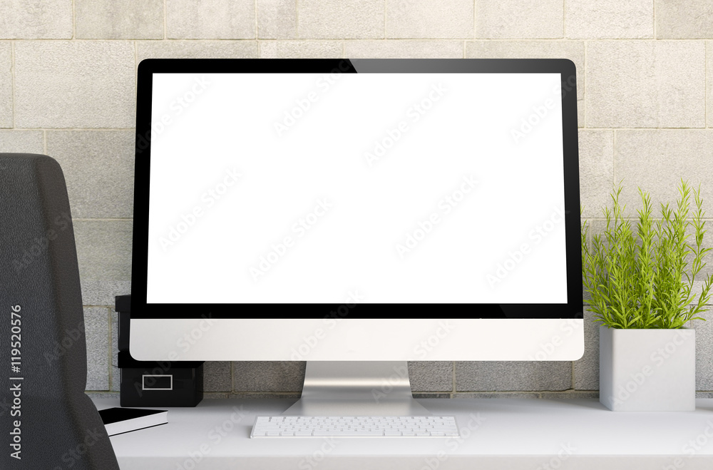 Wall mural workspace with blank screen computer