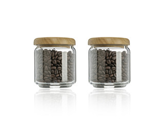 Coffee beans in glass bottle on white background