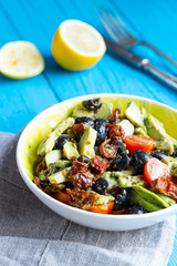 Fresh Healthy Salad with Avocado and Sun-Dried Tomatoes, Vertical View