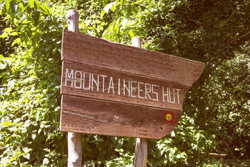 Hiking Wooden pointer at forest.