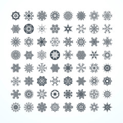 Collection of black snowflakes on a white background