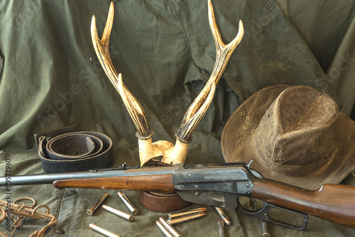 Hunting Rifle, Antlers, Some Bullets 