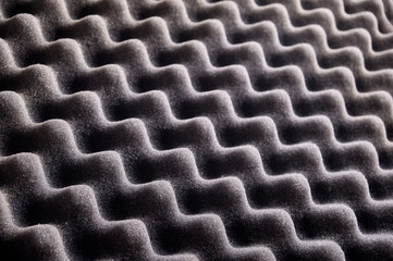 texture of black sponge waves for background