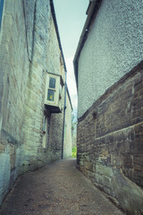 Old alley street of british village, vintage style