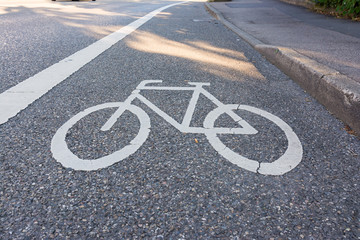 Obraz premium Painted Street Asphalt Bicycle Lane Sign White Safety