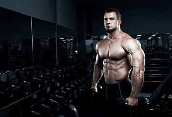 Fototapeta na wymiar Muscular athletic bodybuilder