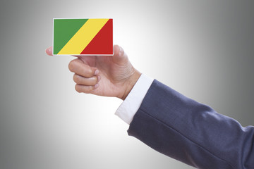 Businessman holding a business card with Congo Republic Flag 
