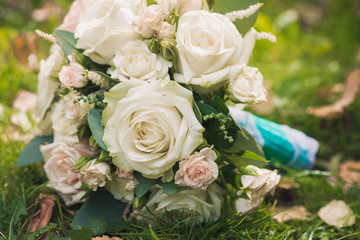 wedding bouquet on green grass