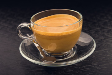 White cup of espresso coffee