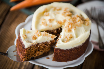 slicing carrot cake, natural light