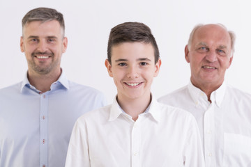 Boy and the male part of his family