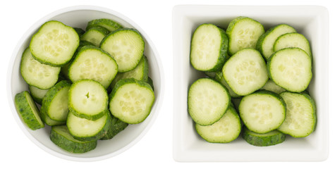 Fresh slice cucumber in white bowl on white background.