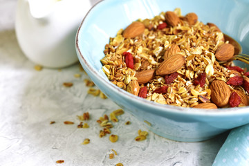 Homemade organic granola with almond and goji berries.