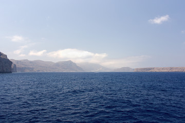 Fototapeta premium Beautiful and calm sea surrounded by rocks