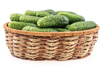 Cucumber on basket isolated on white background.