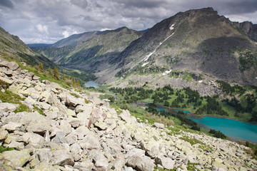 Mountain landscape with the lake and the scree in the foreground, Altai, Siberia.