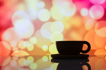 horizontal photo of silhouette coffee cup on colorful bokeh background