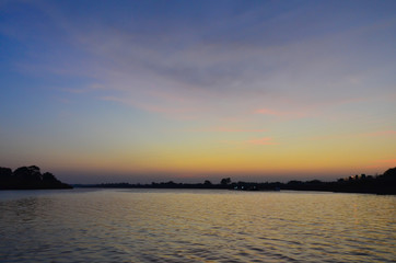 Fototapeta na wymiar Silhouette of lake during sunset