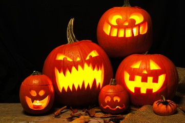 Halloween night scene with a group of spooky Halloween Jack o Lanterns