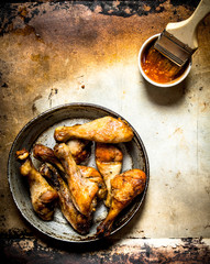 Place the chicken in a pan