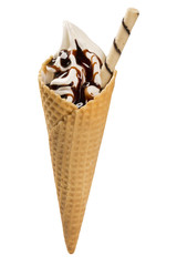 Vanilla ice cream with chocolate syrup in cone