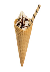 Vanilla ice cream with chocolate syrup in cone