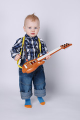little funny boy with guitar