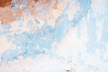 Wall fragment with scratches and cracks