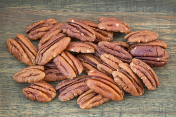 Pecan nuts on a wooden table