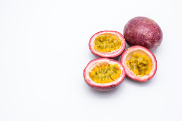 Passion fruit and half isolated on white background.