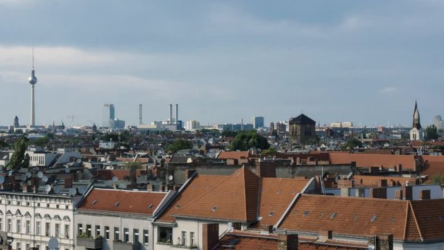 Panoramic time lapse of roofs of Neukölln and Kreuzberg neigorhoods in Berlin, Germany. Diverse culture and attractive area for hipsters and informal youth.