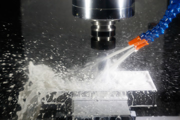 cnc machining center milling with coolant © gen_A