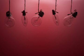 five lamps on a red background