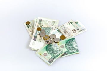Polish zloty in notes and coins, photograph with depth of field.