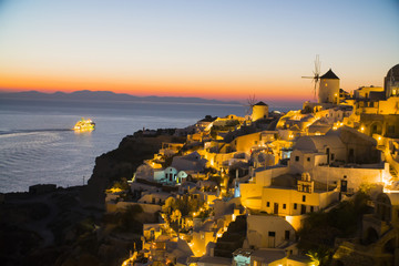 beautiful night in Santorini Greece, sea, sunset, white Greek houses in the evening