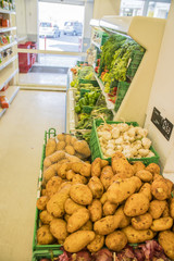 vegetable counter at the grocery store European supermarket, Mall with a bunch of potatoes