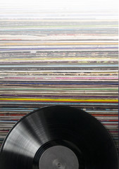 Stack of old vinyl records.
