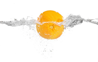 Fototapeta na wymiar Grapefruit in water on white background