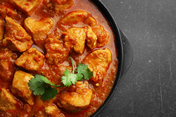 Chicken curry on dark background