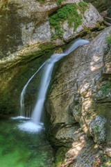 The canyon Mostnica (Korita Mostnice) with crystal clear water and Mostnica waterfall in Triglav national park, Slovenia