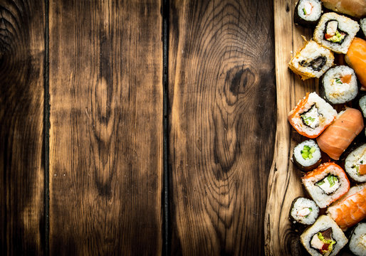 Sushi and rolls on the Board.