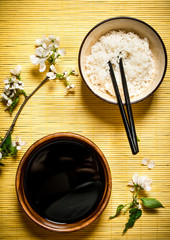 Boiled rice with soy sauce and the cherry branches