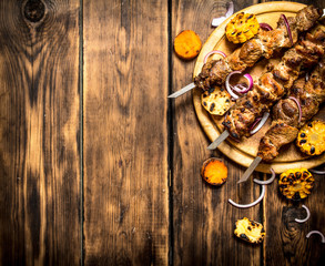 Shish kebab with grilled vegetables.