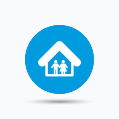Family icon. Father and mother in home sign.