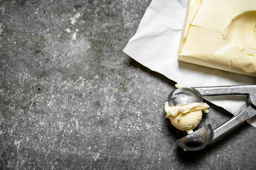 Butter in a special scissors.